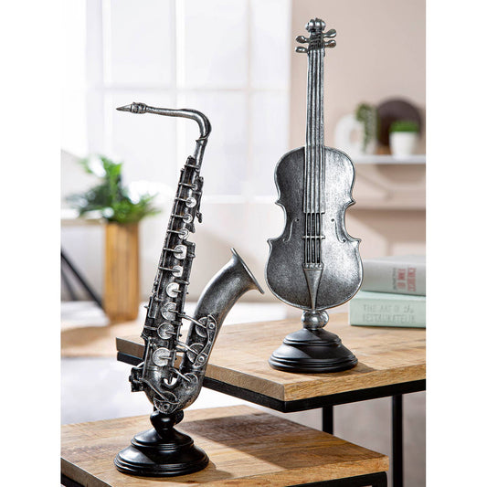 Beeldhouwwerk Cello & Saxofoon 2-sort. zilverkleurig, VE 2: Op basis, antieke afwerking, op ronde basis: 9 x 9,5 x 3,5 cm Cello: 10 x 10 x 36 cm Saxofoon: 14,5 x 10 x 36,5 cm / Zilver / Kunsthars
