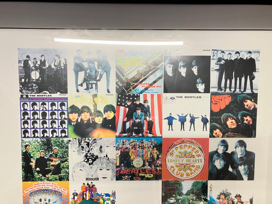 The Beatles poster in lijst.