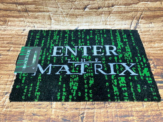 "Zwarte Matrix‑deurmat met groene digitale regen en de tekst ‘Enter the Matrix’, geschikt voor filmfans en gaming decoratie."