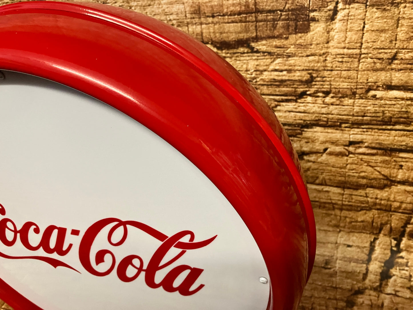 Lichtreclame met Coca Cola opdruk.