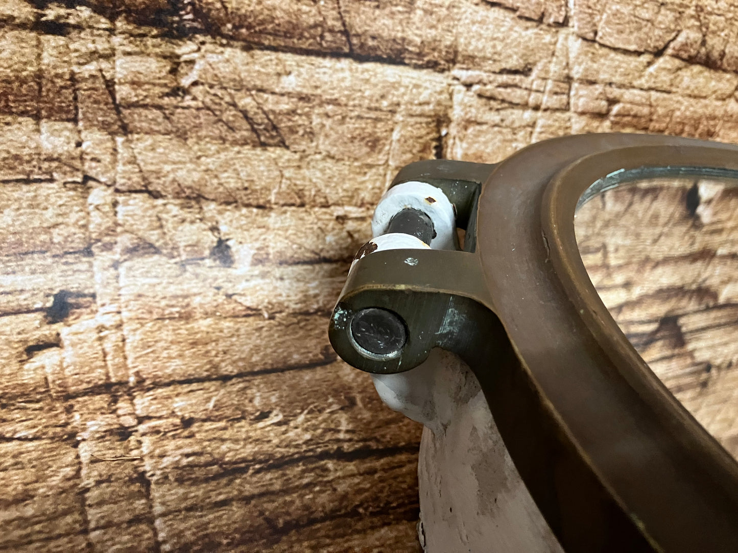 Antiek patrijspoort met spiegel