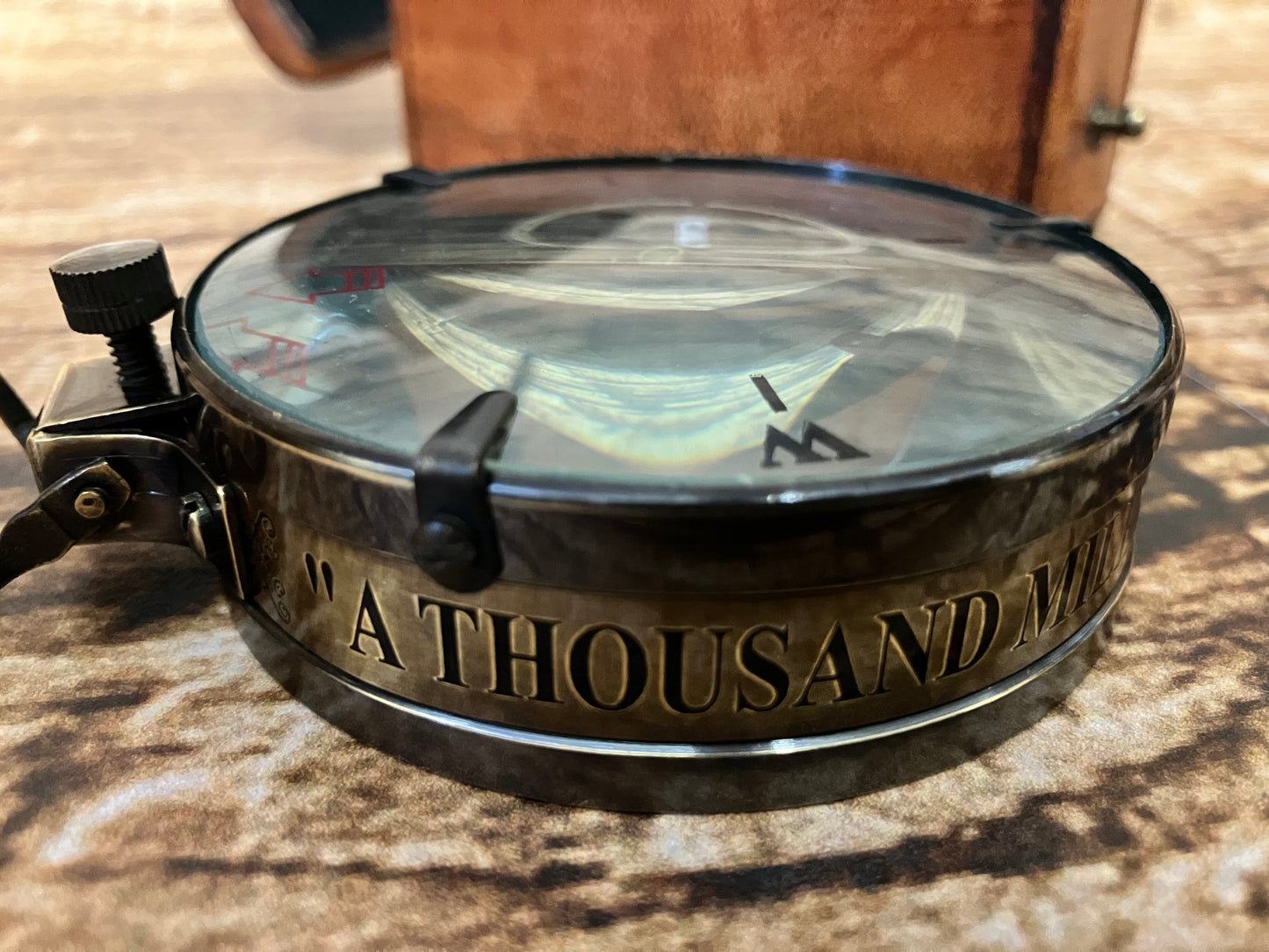 Kompas in lederen etui.