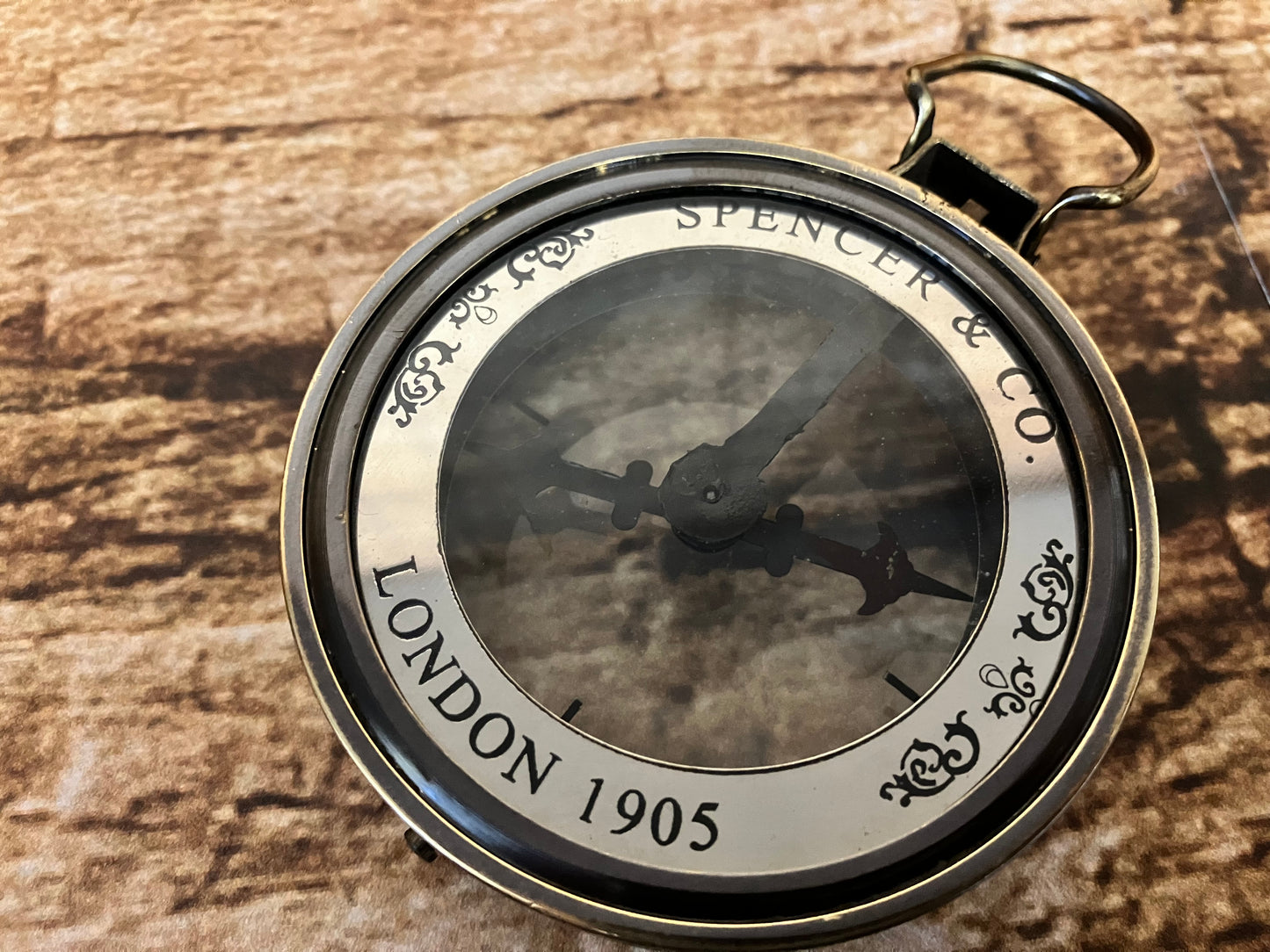 Kompas in lederen etui.