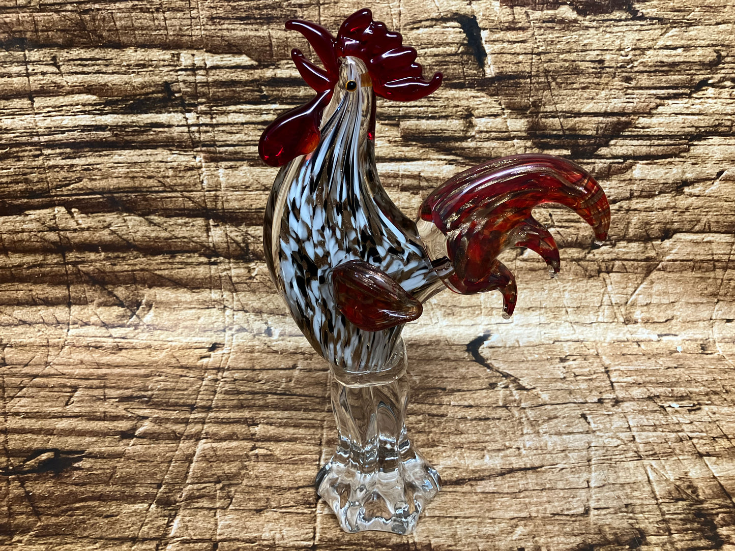 Glazen haan sculptuur