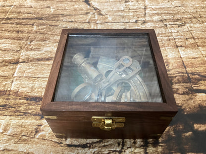 Travelling sextant in storage box.