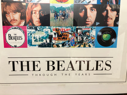 The Beatles poster in lijst.