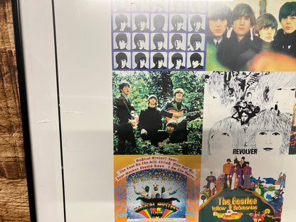 The Beatles poster in lijst.
