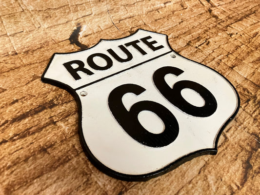 Route 66 cast iron wall sign
