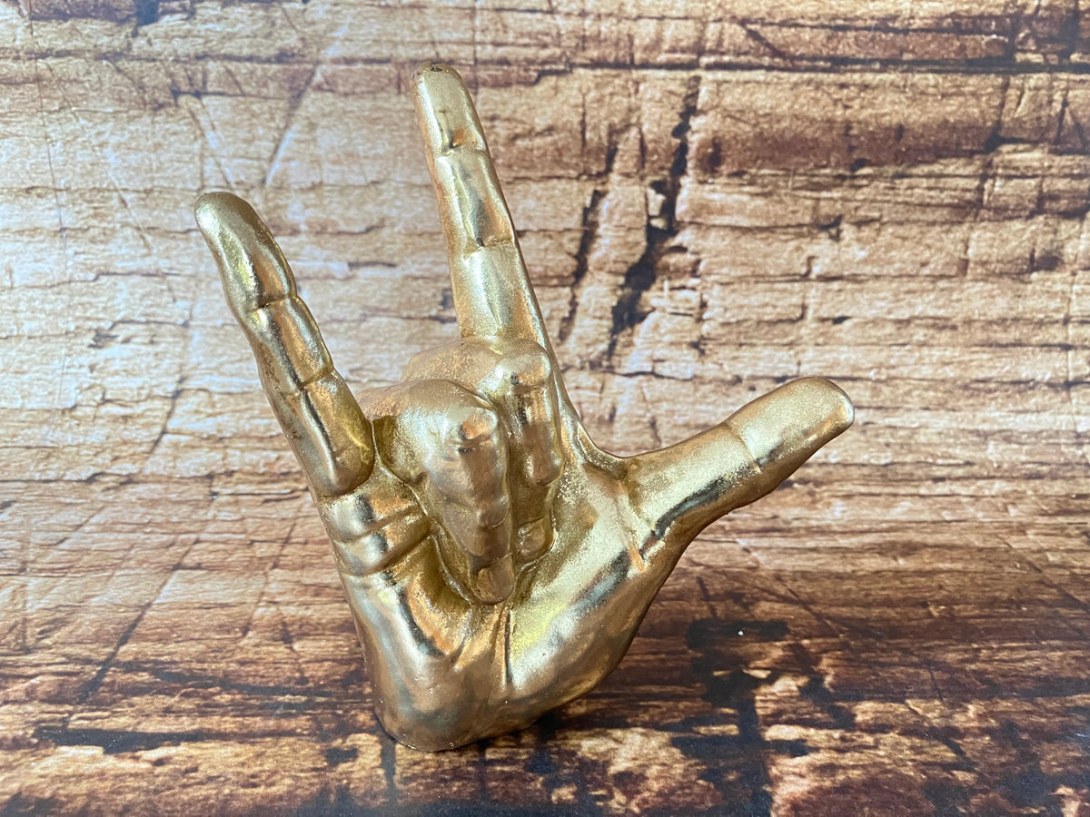 Gouden handbeeldje "I Love You" / "Rock On"