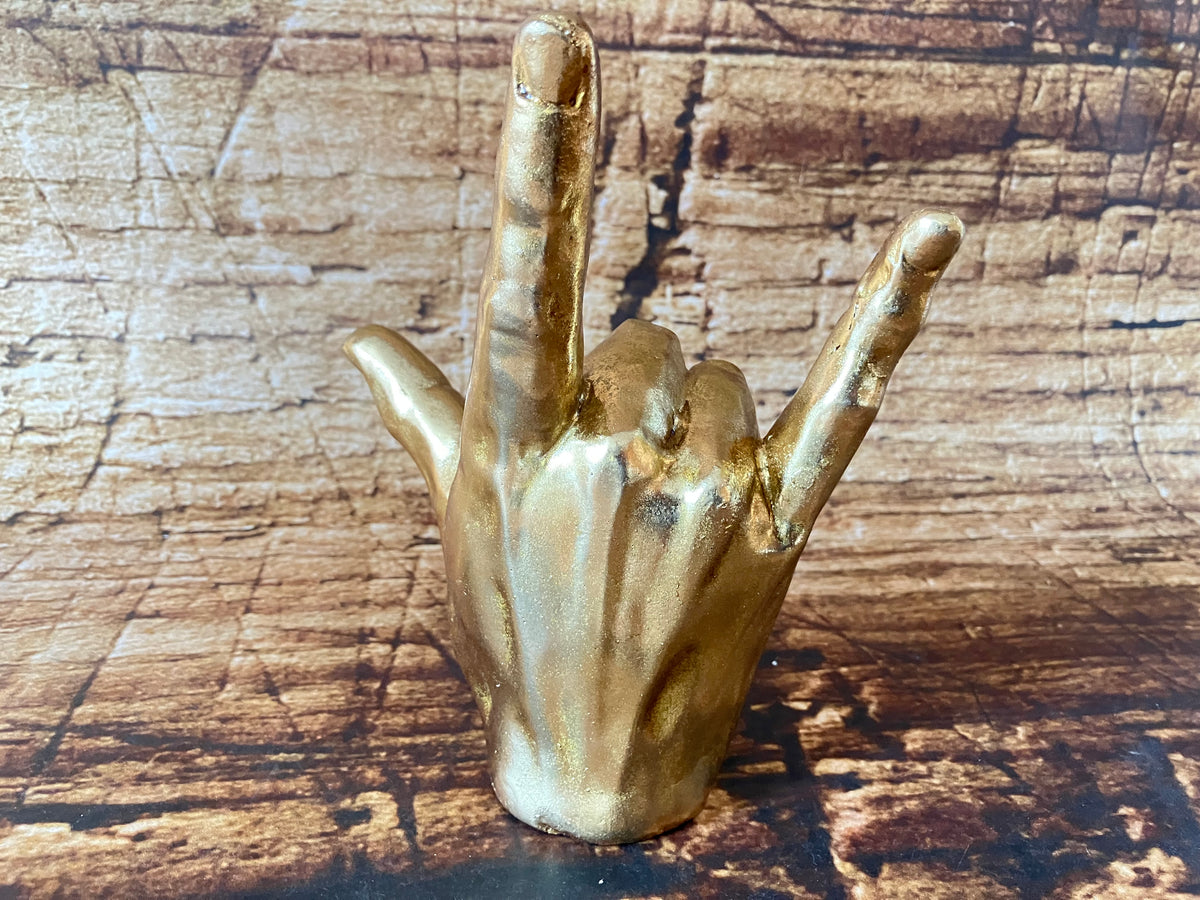 Gouden handbeeldje "I Love You" / "Rock On"