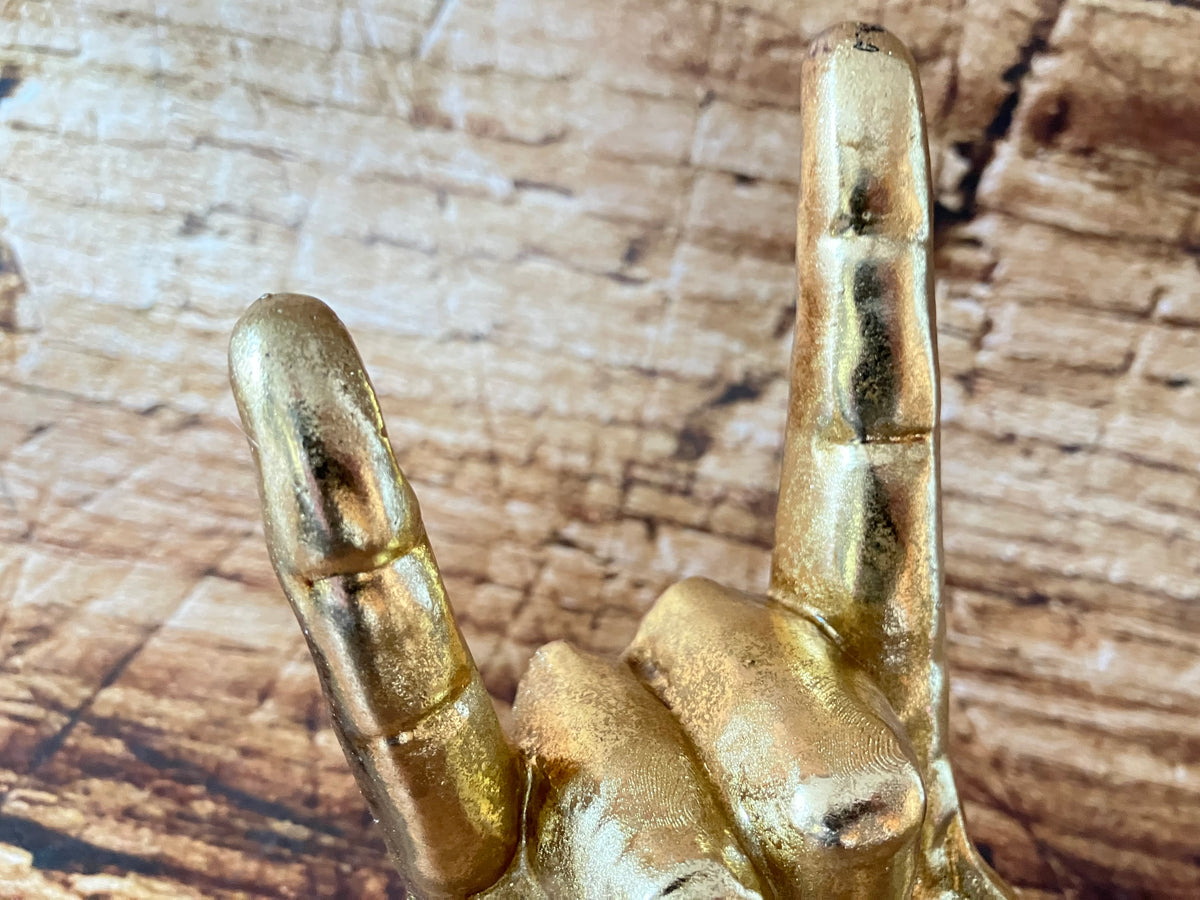 Gouden handbeeldje "I Love You" / "Rock On"