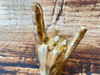 Gouden handbeeldje "I Love You" / "Rock On"